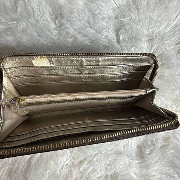 Michael Kors Jet Set
Travel Continental Zip Around Wallet PVC Brown - Picture 4 of 4